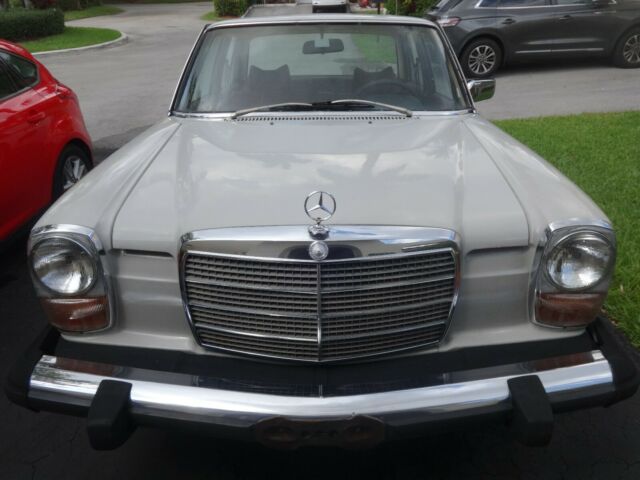 1976 White Mercedes-Benz 200-Series Sedan