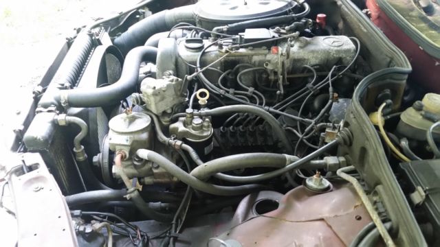 1982 Burgundy Mercedes-Benz 300-Series Sedan