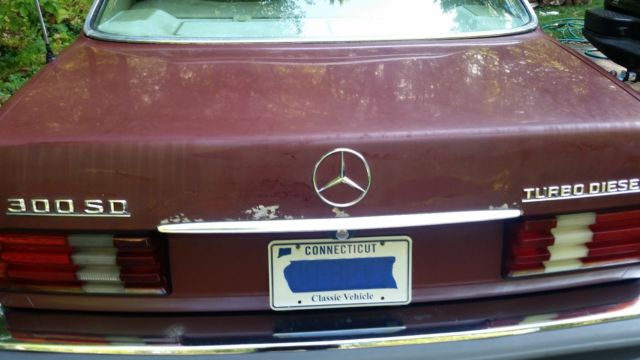 1982 Burgundy Mercedes-Benz 300-Series Sedan
