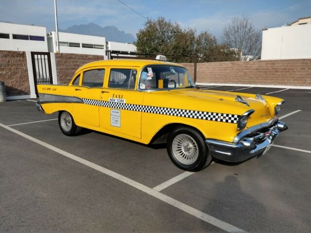 1957 Yellow Chevrolet Bel Air/150/210 Sedan