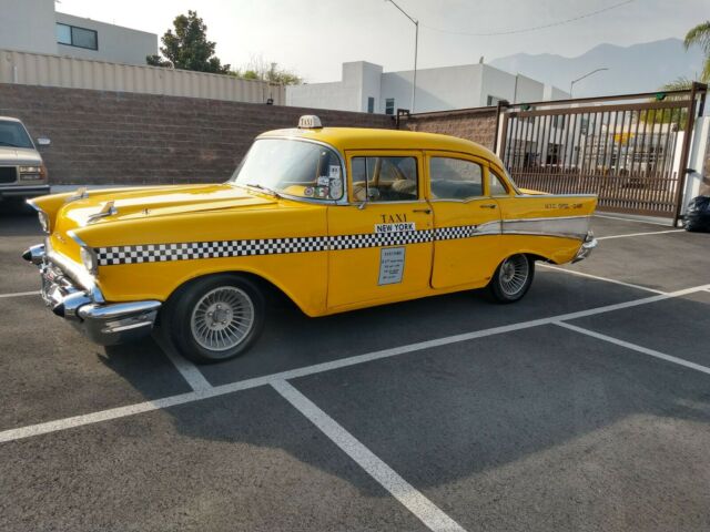 1957 Yellow Chevrolet Bel Air/150/210 Sedan