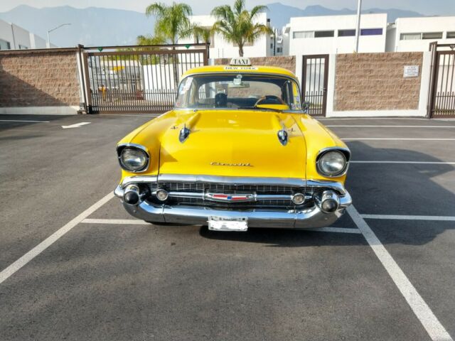 1957 Yellow Chevrolet Bel Air/150/210 Sedan