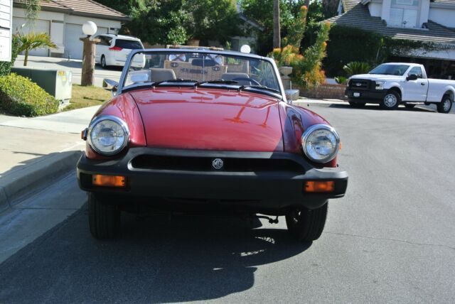 1979 red MG Midget Convertible
