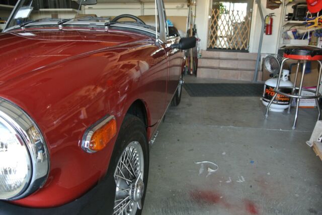 1979 red MG Midget Convertible