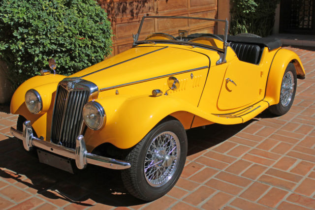 1954 primer over green MG T-Series 2-door conv