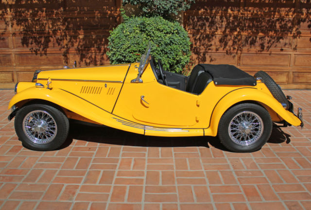 1954 primer over green MG T-Series 2-door conv