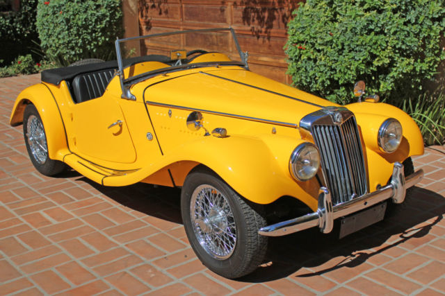 1954 primer over green MG T-Series 2-door conv