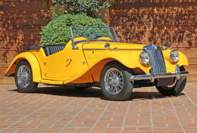 1954 primer over green MG T-Series 2-door conv