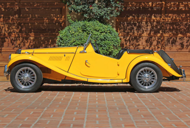 1954 primer over green MG T-Series 2-door conv