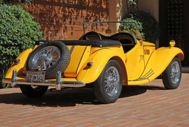 1954 primer over green MG T-Series 2-door conv