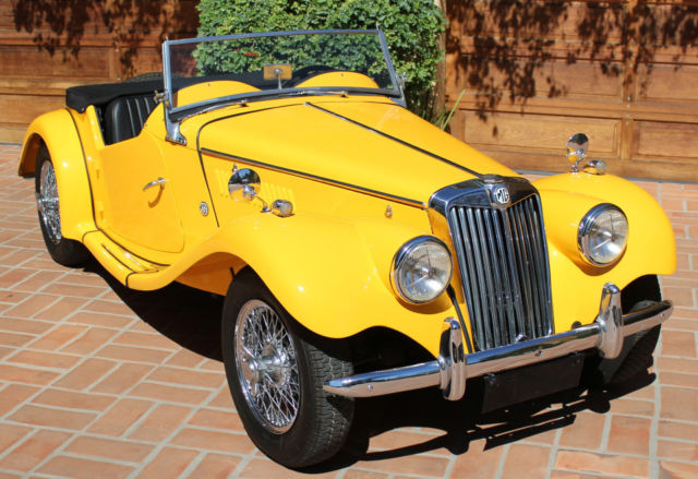 1954 primer over green MG T-Series 2-door conv