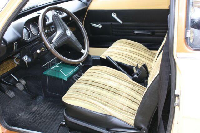 1974 Yellow Ford Escort Sedan