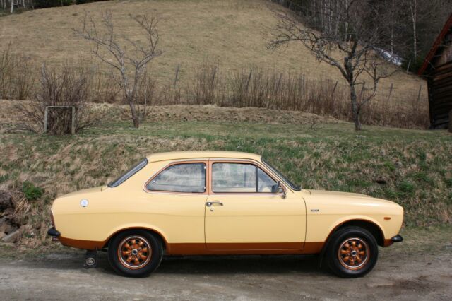 1974 Yellow Ford Escort Sedan