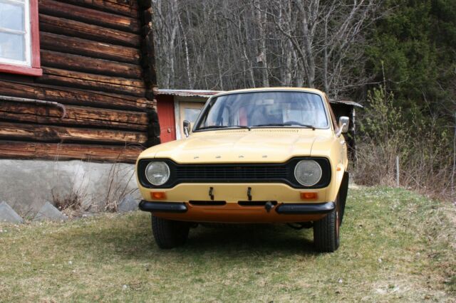 1974 Yellow Ford Escort Sedan