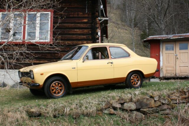 1974 Yellow Ford Escort Sedan