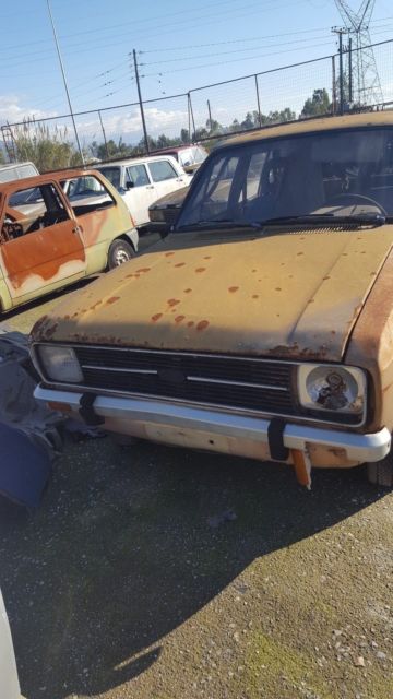 1978 Gold Ford Escort Limousine