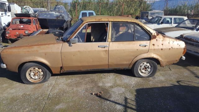 1978 Gold Ford Escort Limousine