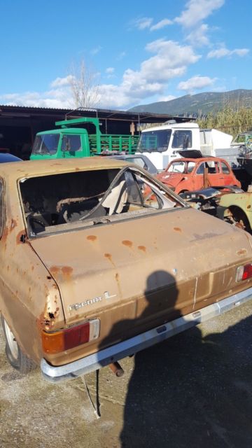 1978 Gold Ford Escort Limousine