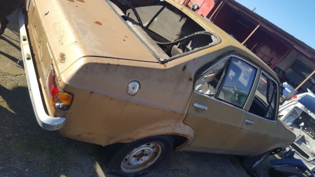 1978 Gold Ford Escort Limousine