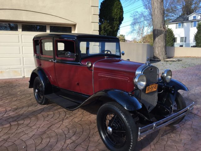 1931 Burgundy Ford Model A four door coupe