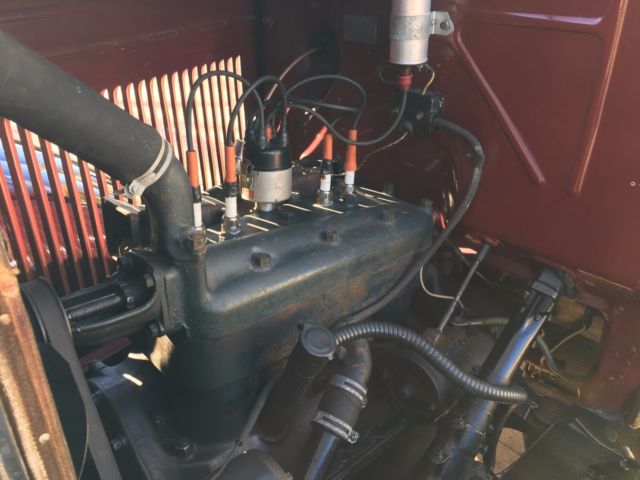1931 Burgundy Ford Model A four door coupe