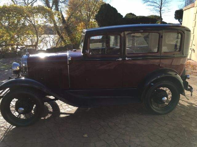 1931 Burgundy Ford Model A four door coupe