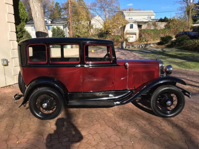 1931 Burgundy Ford Model A four door coupe