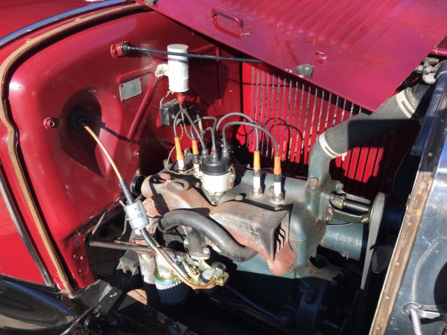 1931 Burgundy Ford Model A four door coupe
