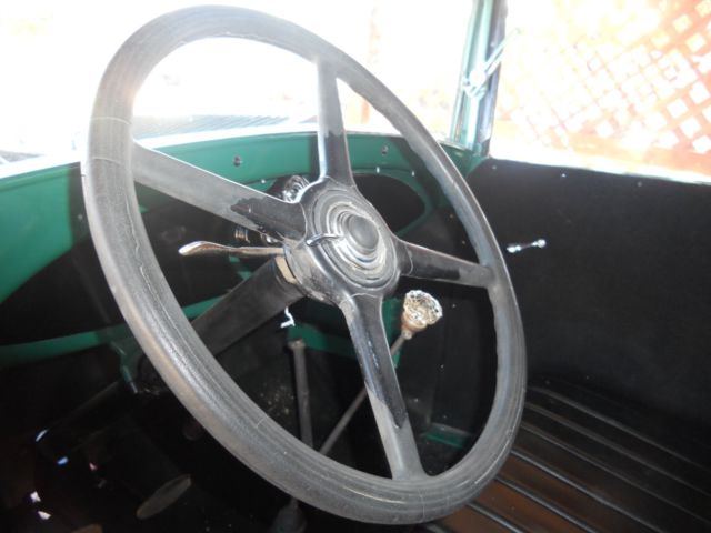 1930 green  black Ford Model A 2 dr