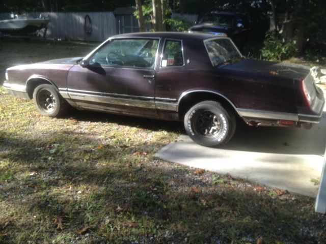 1986 Burgundy Chevrolet Monte Carlo Coupe