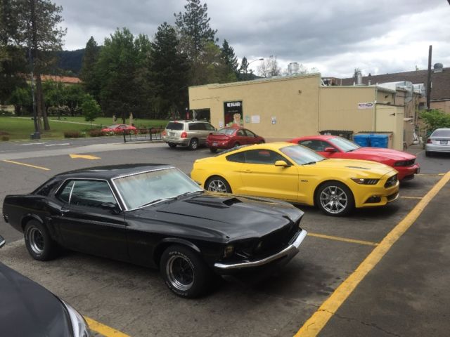 1969 creamy ivory Ford Mustang