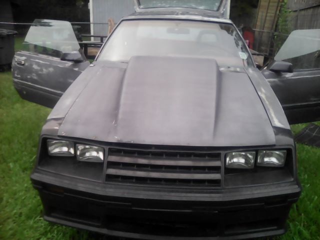 1980 Primer black Ford Mustang Foxbody