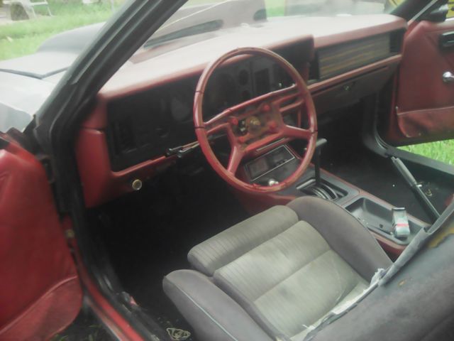 1980 Primer black Ford Mustang Foxbody