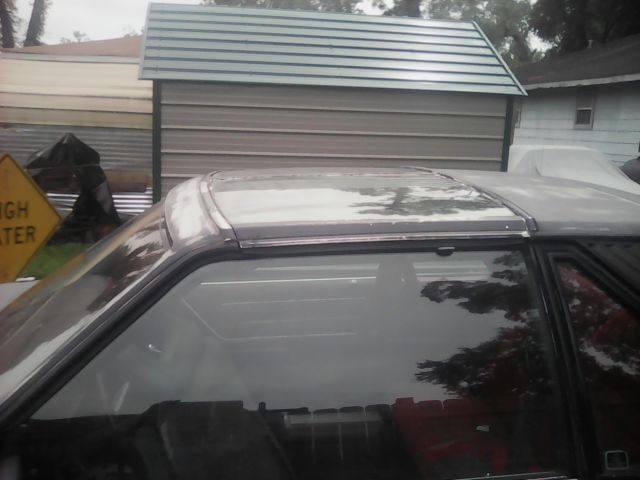 1980 Primer black Ford Mustang Foxbody