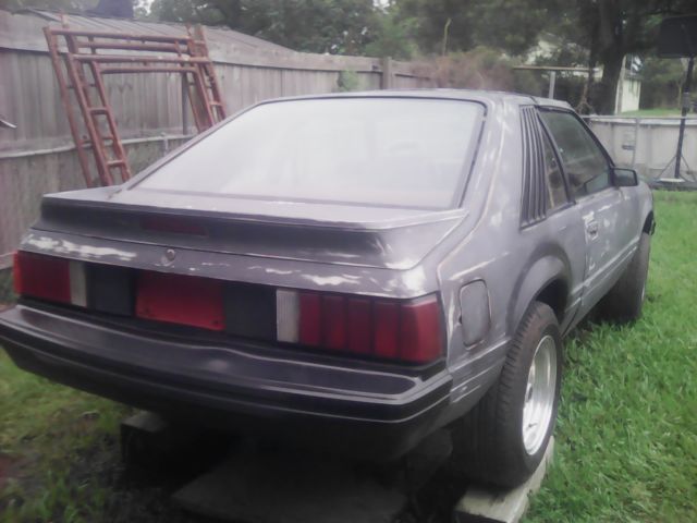 1980 Primer black Ford Mustang Foxbody