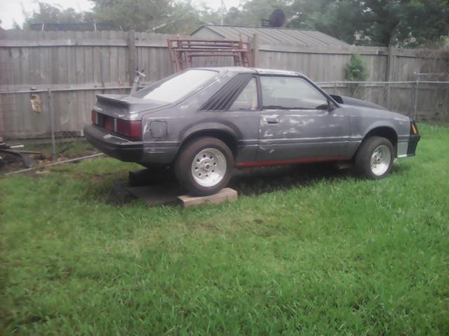 1980 Primer black Ford Mustang Foxbody