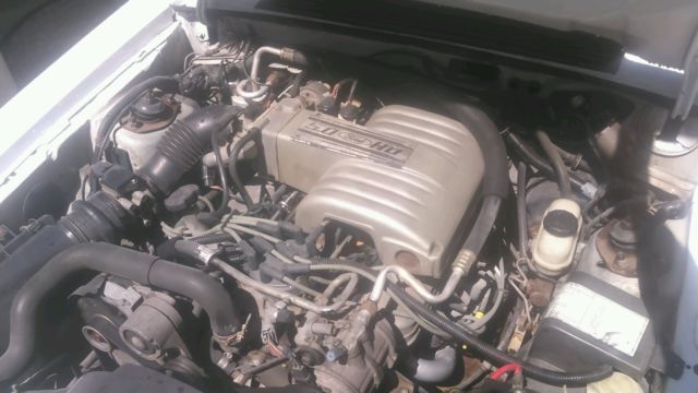 1989 White Ford Mustang Convertible