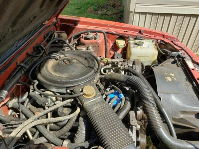 1984 Red Ford Mustang Convertible
