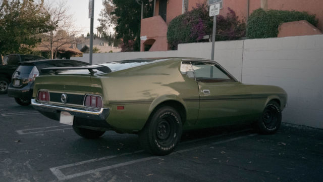 1972 green Ford Mustang Fastback