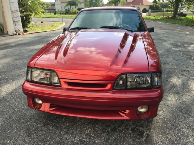1989 Burgundy Ford Mustang Hatchback