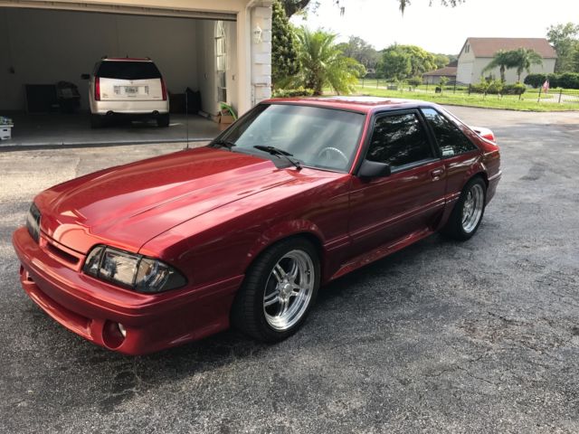 1989 Burgundy Ford Mustang Hatchback