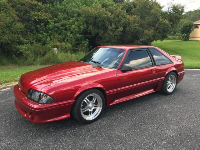 1989 Burgundy Ford Mustang Hatchback