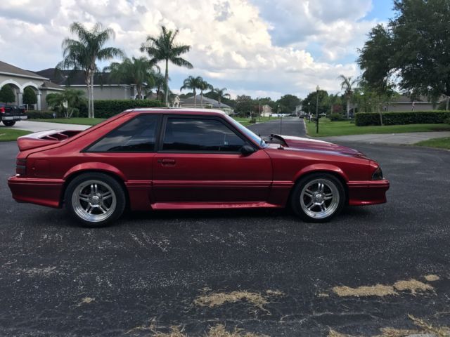 1989 Burgundy Ford Mustang Hatchback