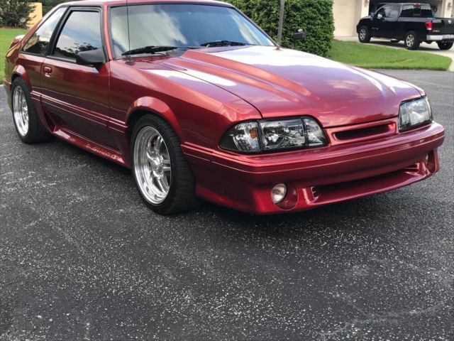 1989 Burgundy Ford Mustang Hatchback