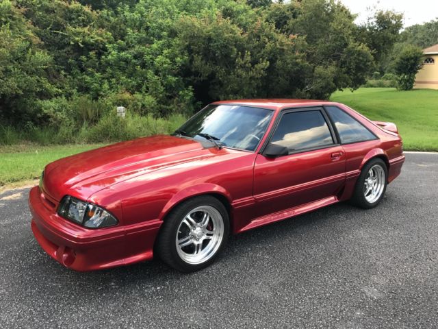 1989 Burgundy Ford Mustang Hatchback
