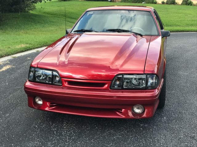 1989 Burgundy Ford Mustang Hatchback