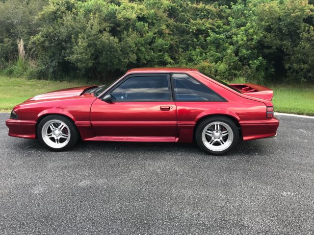 1989 Burgundy Ford Mustang Hatchback