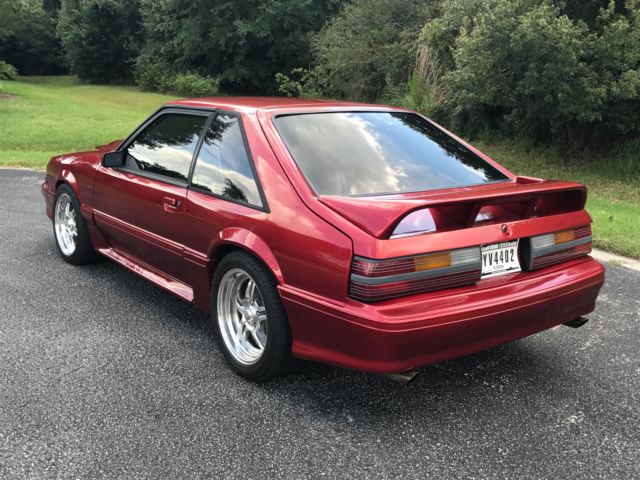 1989 Burgundy Ford Mustang Hatchback