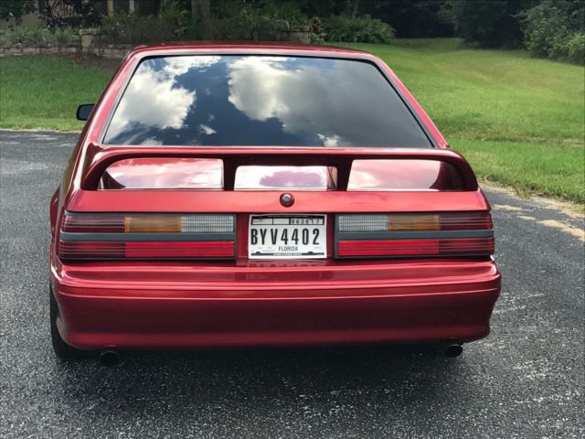 1989 Burgundy Ford Mustang Hatchback