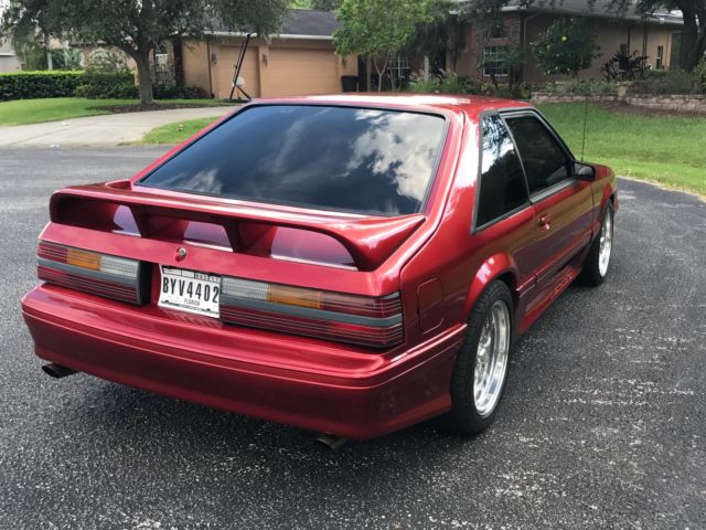 1989 Burgundy Ford Mustang Hatchback